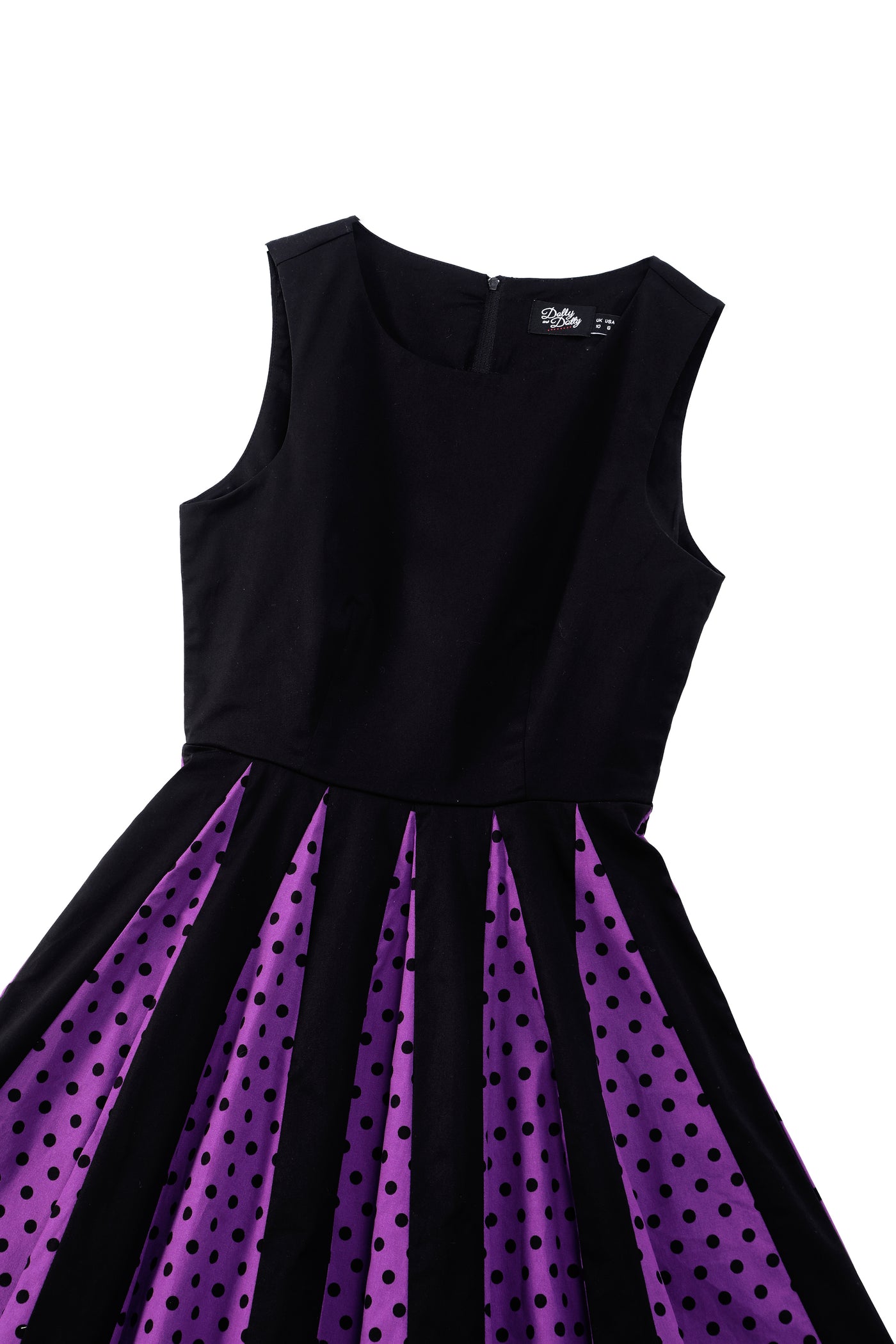 Close up view of  Pleated Black Dress With Purple Polka Dots