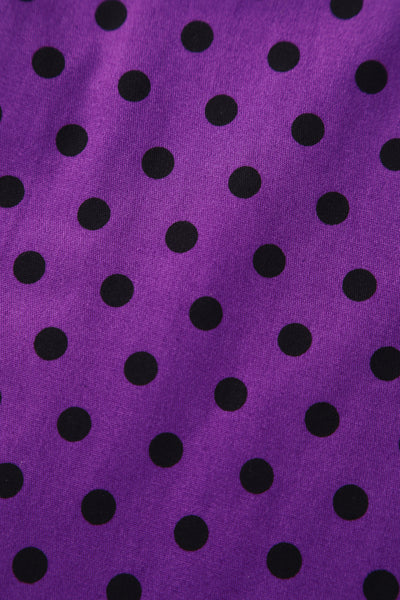 Close up view of  Pleated Black Dress With Purple Polka Dots