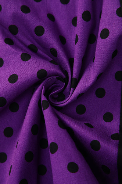 Close up view of  Pleated Black Dress With Purple Polka Dots