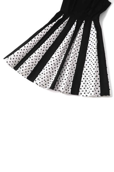 Close up view of Pleated Black Dress With White Polka Dots