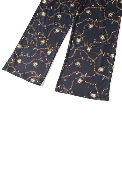 Close up View of Pocket Watch Print Jumpsuit in Black