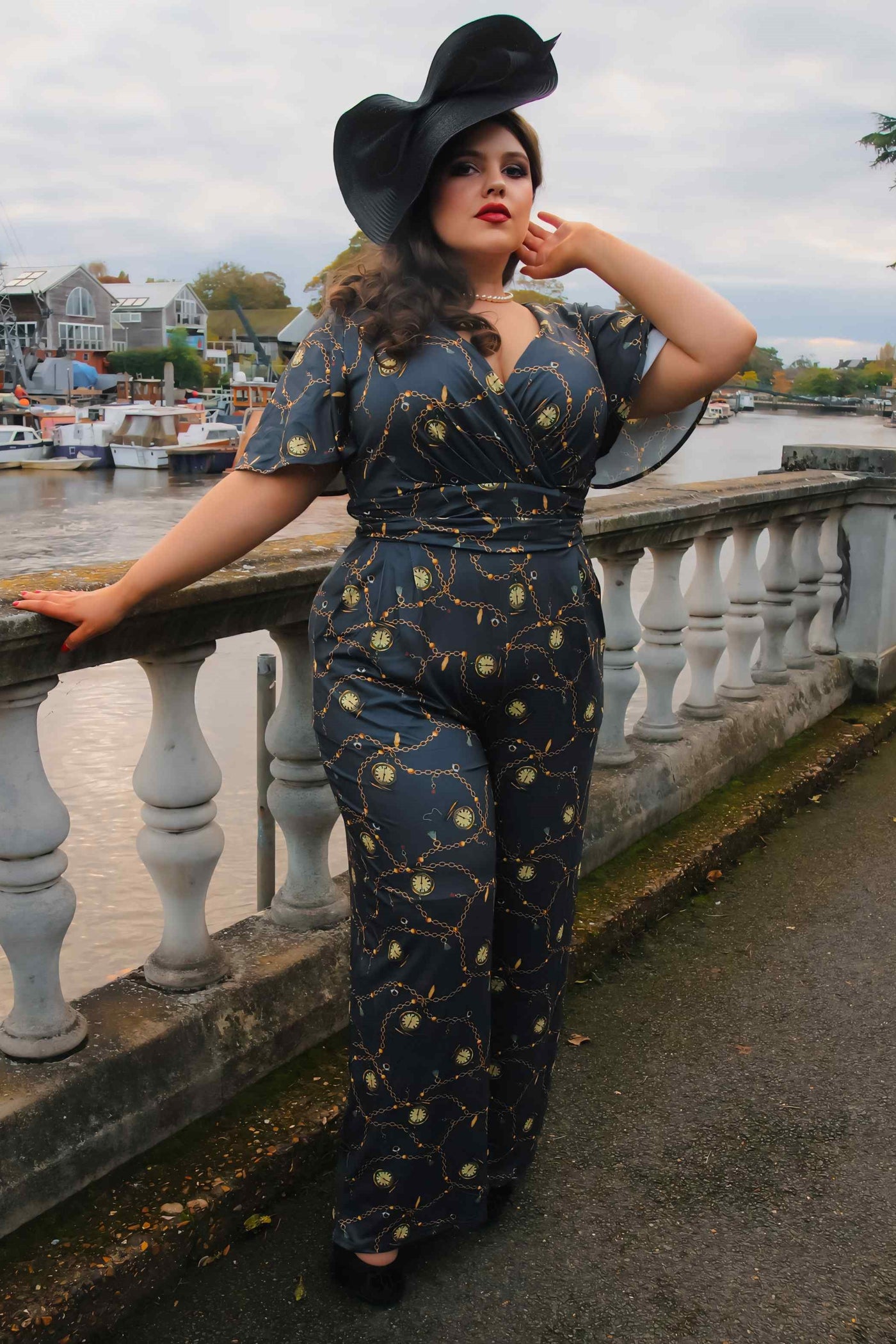 A model wearing a Black Pocket Watch Jumpsuit