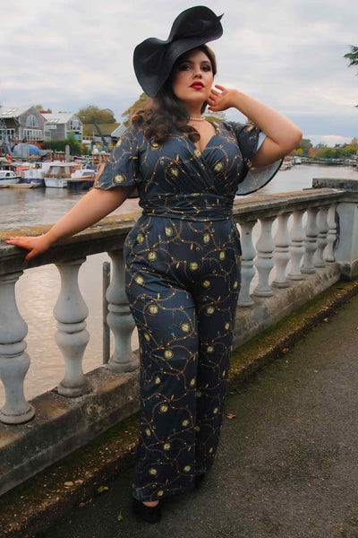 A model wearing a Black Pocket Watch Jumpsuit