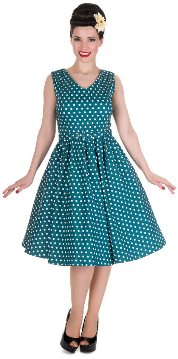 Model wears our V neck swing dress, in teal polka dot print, front view
