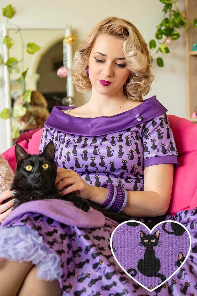 A model wearing a  Purple Black Cat Swing Dress