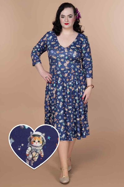 A lady wearing a Purple Cat In Space Print Dress