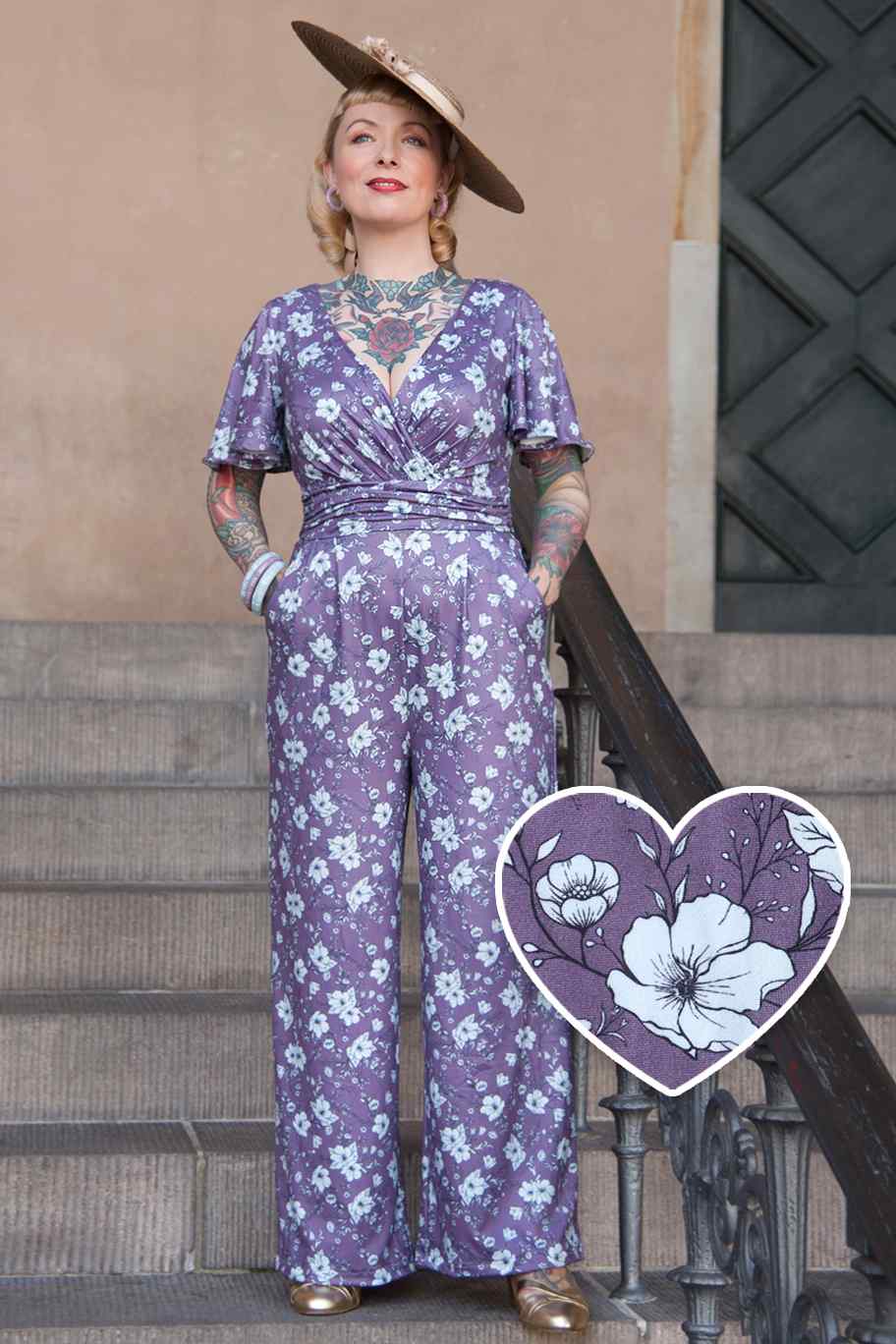 A model wearing a Purple Floral Butterfly Sleeved Jumpsuit