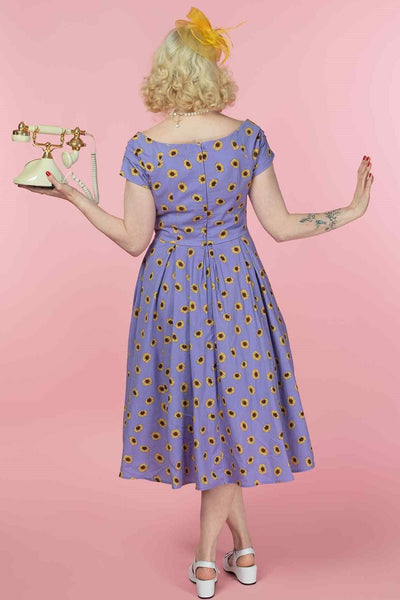 A model wearing a Purple Off Shoulder Dress With Yellow Sunflowers