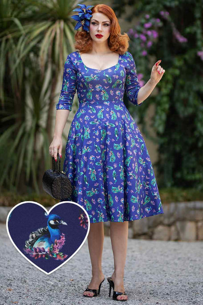 A model wearing a Purple Peacock Mid Calf Dress