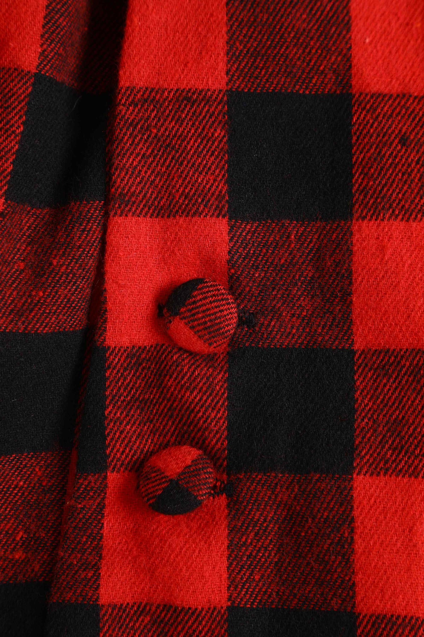 Close up view of Red Check Jumpsuit
