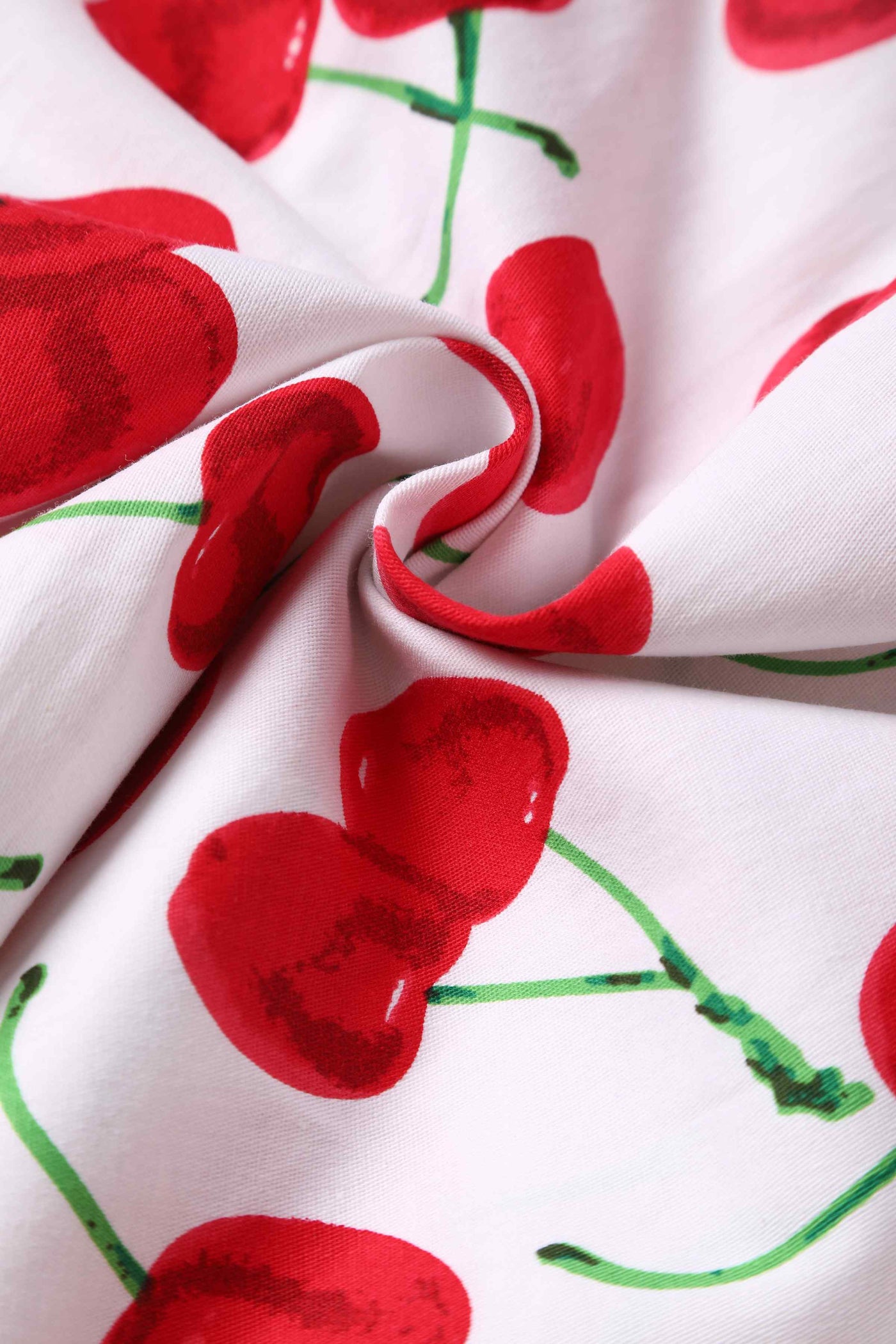 Close up view of Red Cherry Dress In White