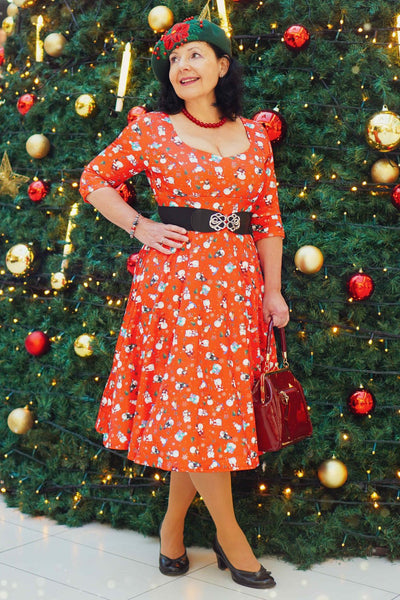 A model wearing Red Snowman Midi Dress