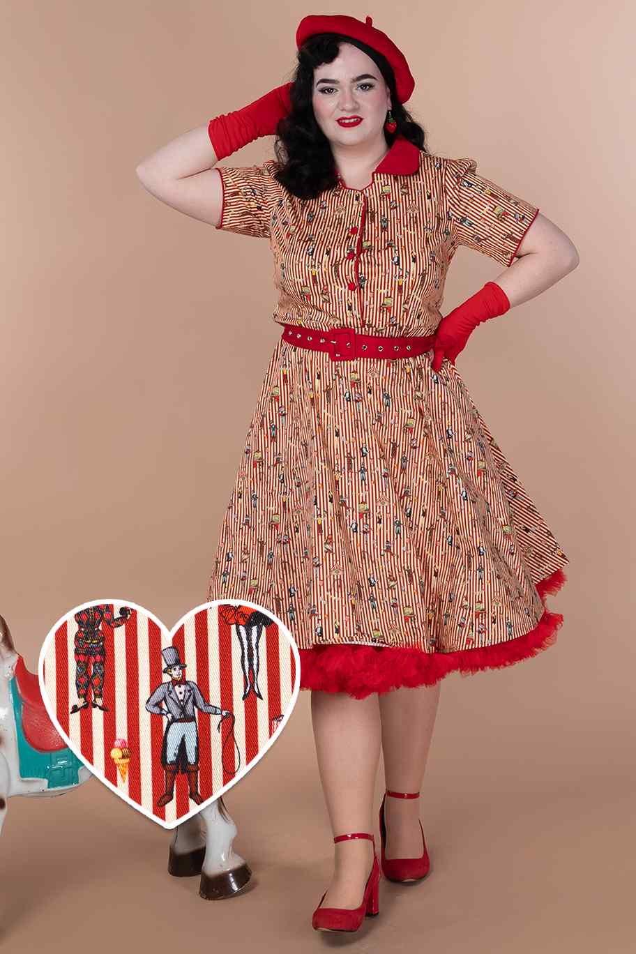 A model wearing a  Red Vintage Circus Striped Shirt Dress