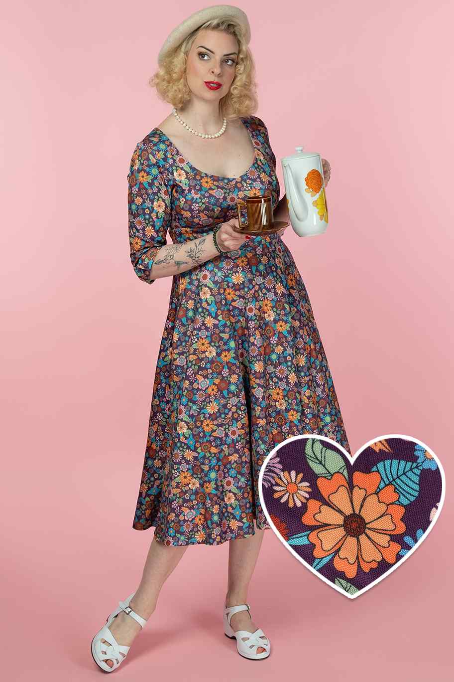 A model wearing a Retro 70s Floral Garden Dress