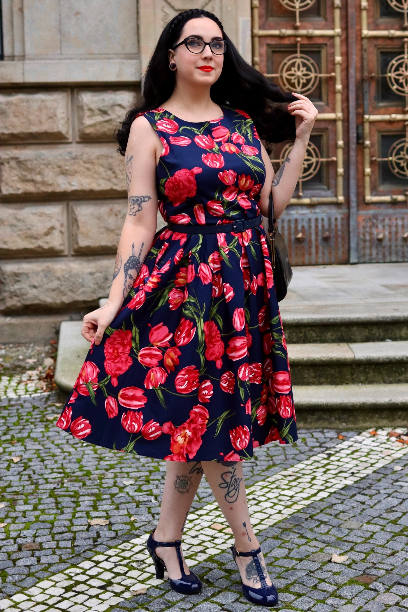 A model wearing a Retro Tulip Floral Swing Dress in Blue-Pink