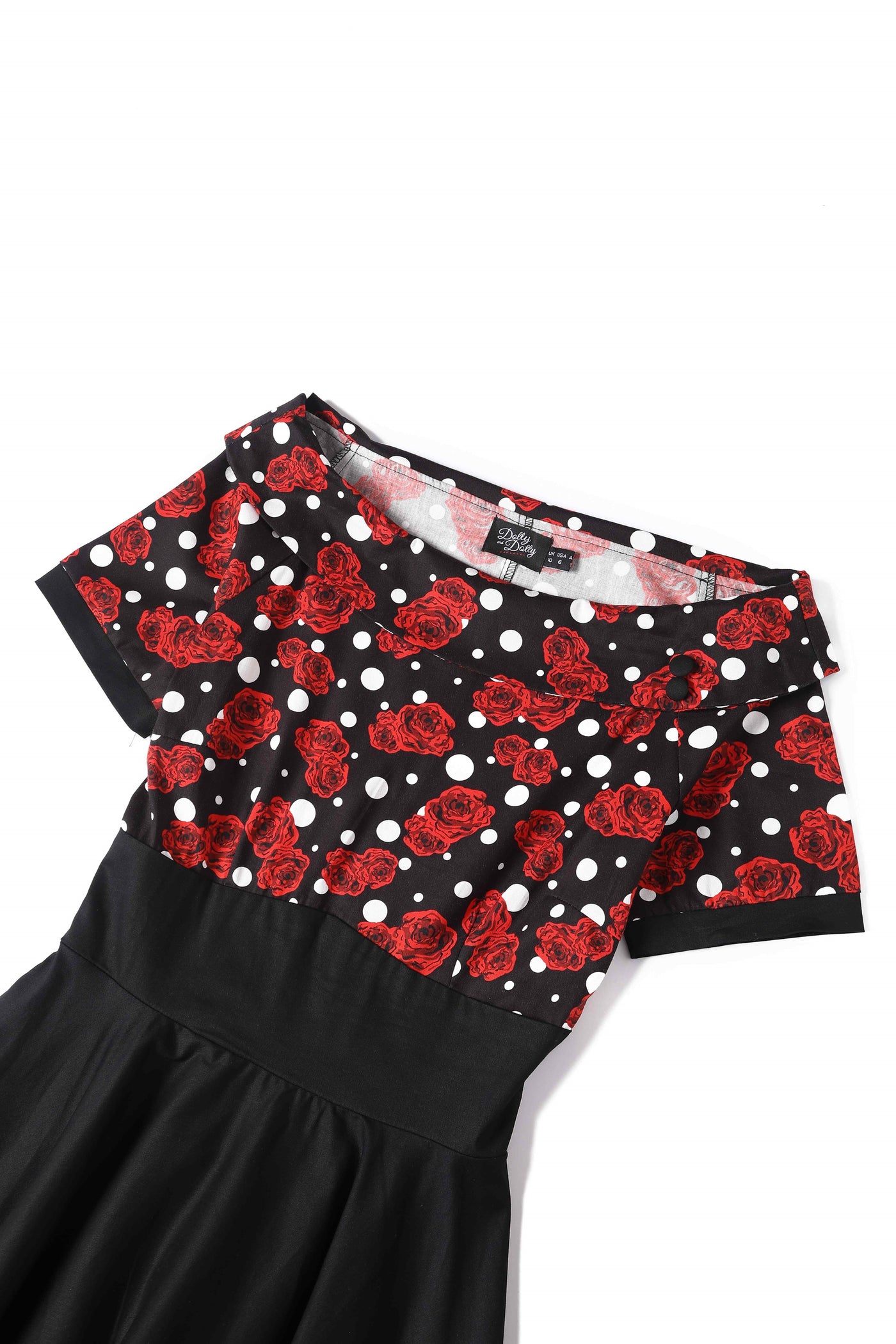 Close up View of Rockabilly Rose Polka Dot Swing Dress In Black 