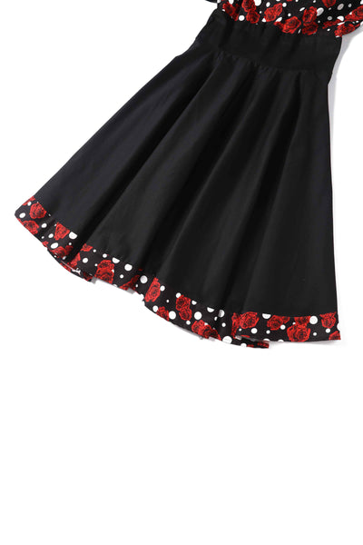 Close up View of Rockabilly Rose Polka Dot Swing Dress In Black 