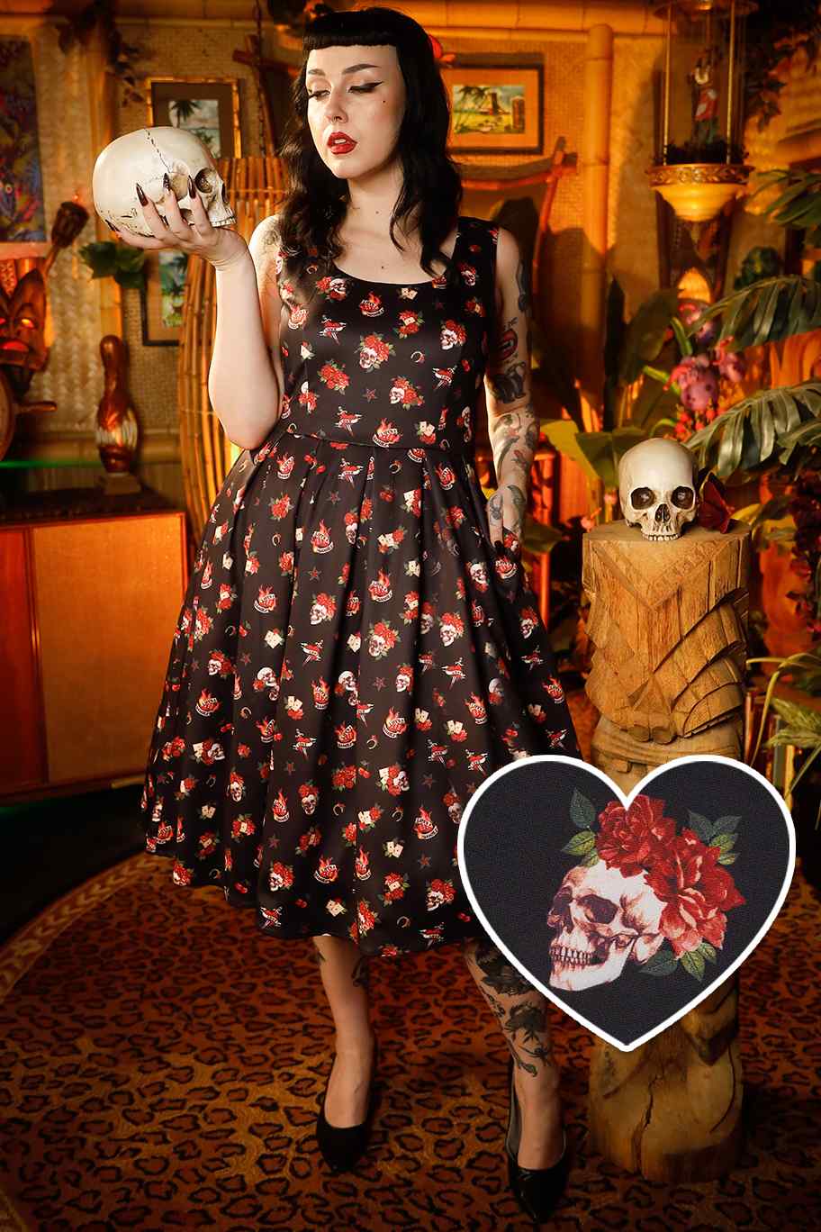 A lady wearing a Rockabilly Skull & Rose Swing Dress