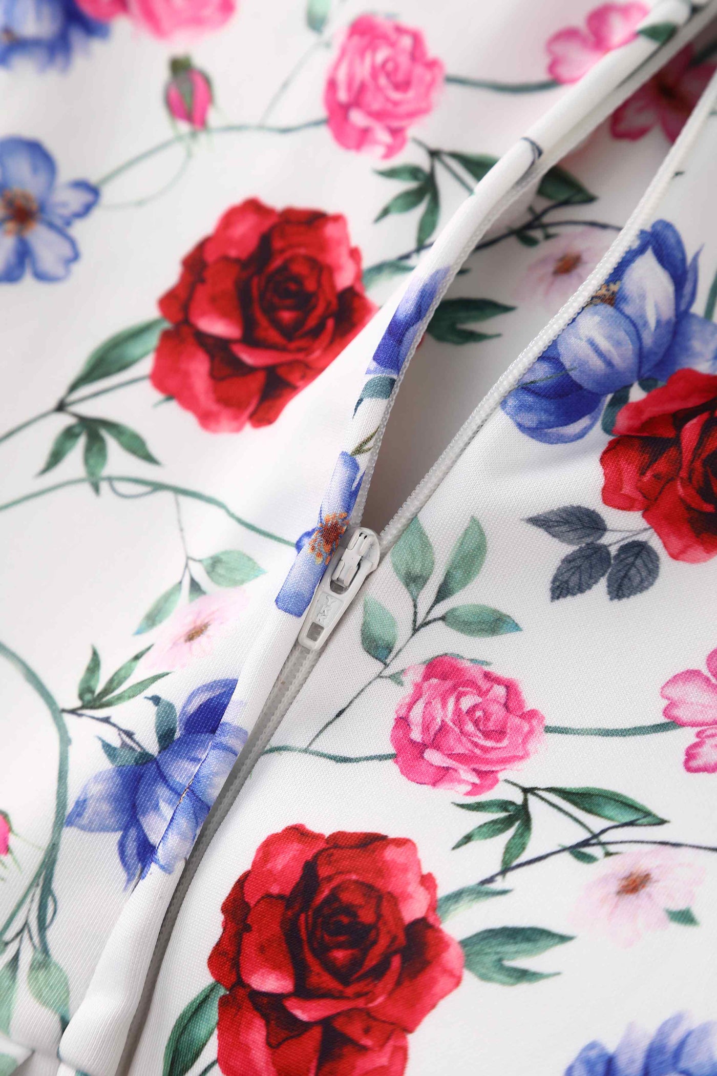 Close up view of Rose Off Shoulder Dress In White