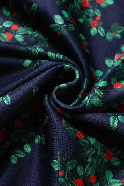 Close up view of Rosebud Midi Dress On Navy Blue