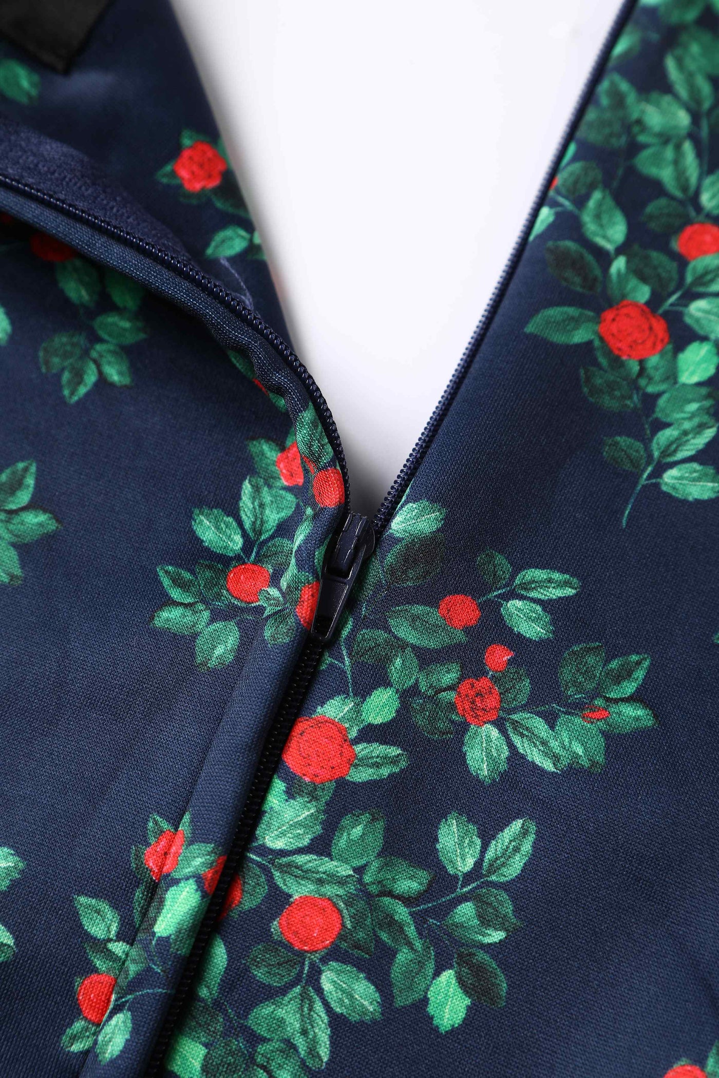 Close up view of Rosebud Midi Dress On Navy Blue