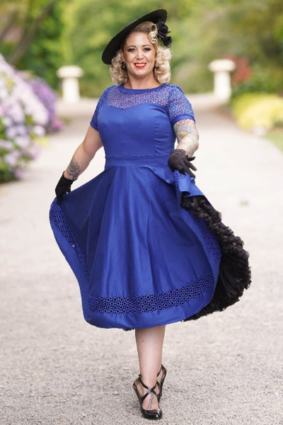 A model wearing a Royal Blue Lace Sleeved Dress