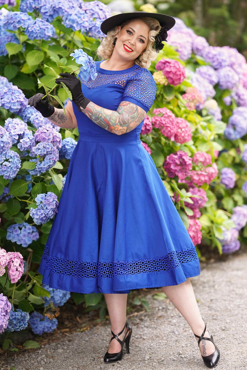 A model wearing a Royal Blue Lace Sleeved Dress