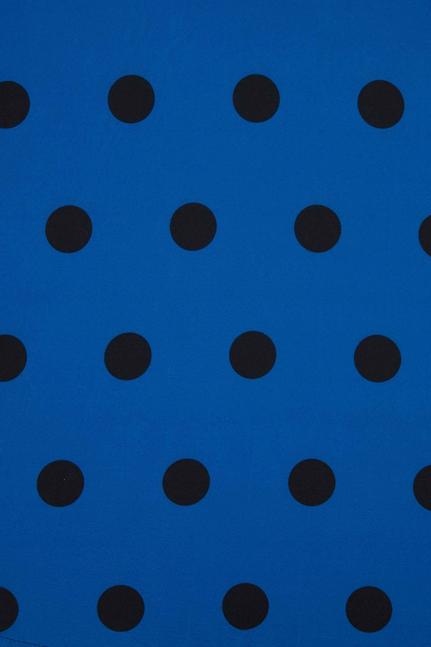 Close up view of Royal Blue Polka Dot Wrap Dress