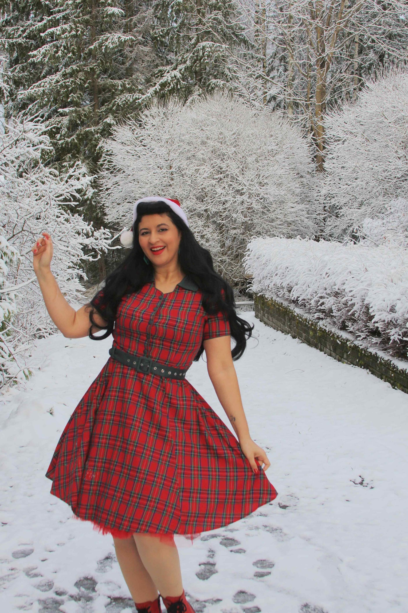 A model wearing Royal Stewart Red Tartan Shirt Dress