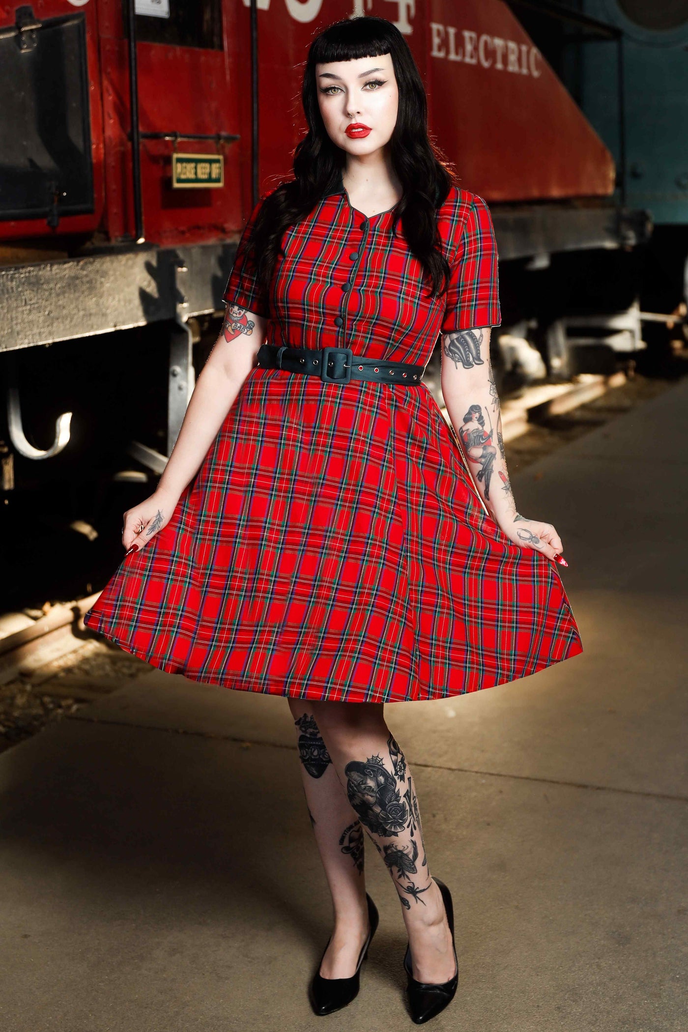 Front view of model wearing Royal Stewart Red Tartan Shirt Dress