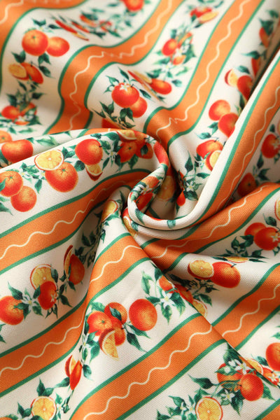 Close up view of Sicilian Orange Stripe Swing Dress With Pockets