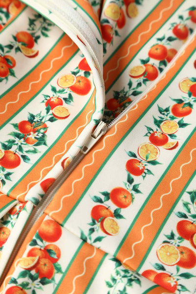 Close up view of Sicilian Orange Stripe Swing Dress With Pockets