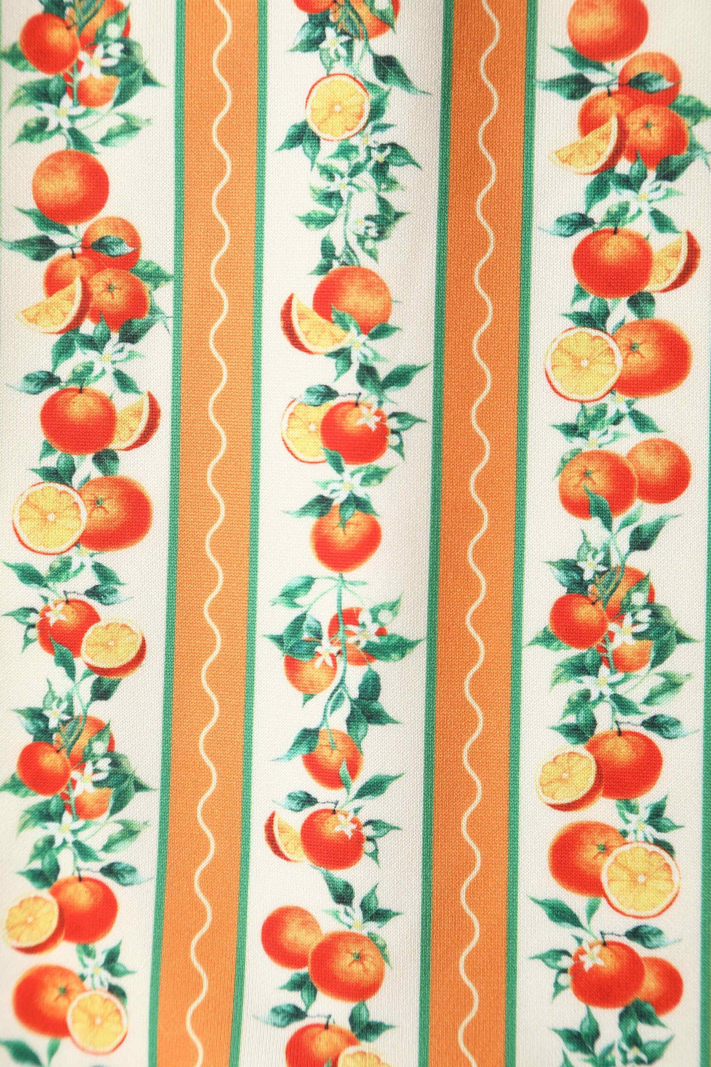 Close up view of Sicilian Orange Stripe Swing Dress With Pockets