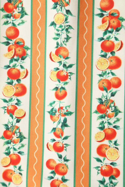 Close up view of Sicilian Orange Stripe Swing Dress With Pockets