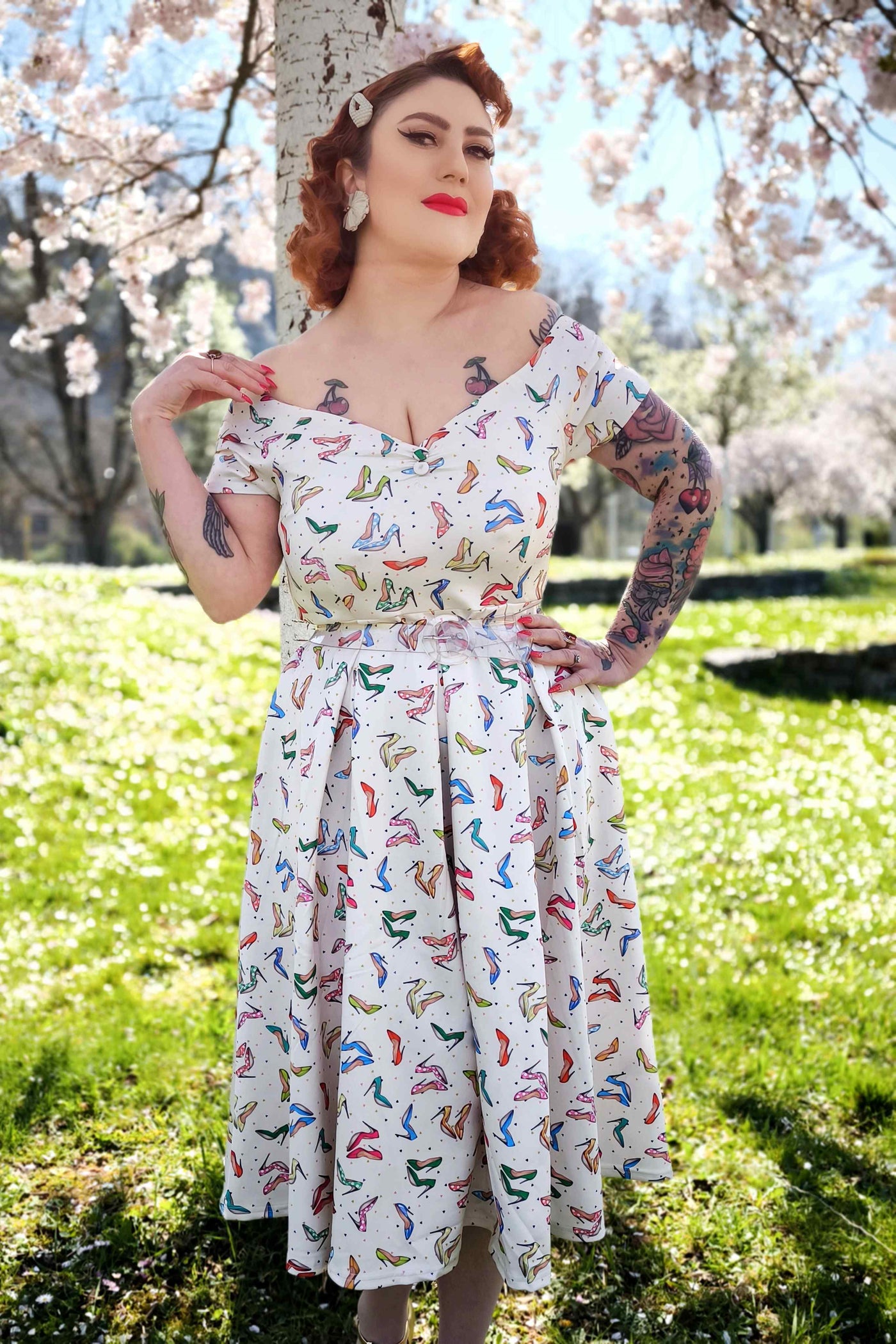 A model wearing a Stiletto Print Off Shoulder Dress
