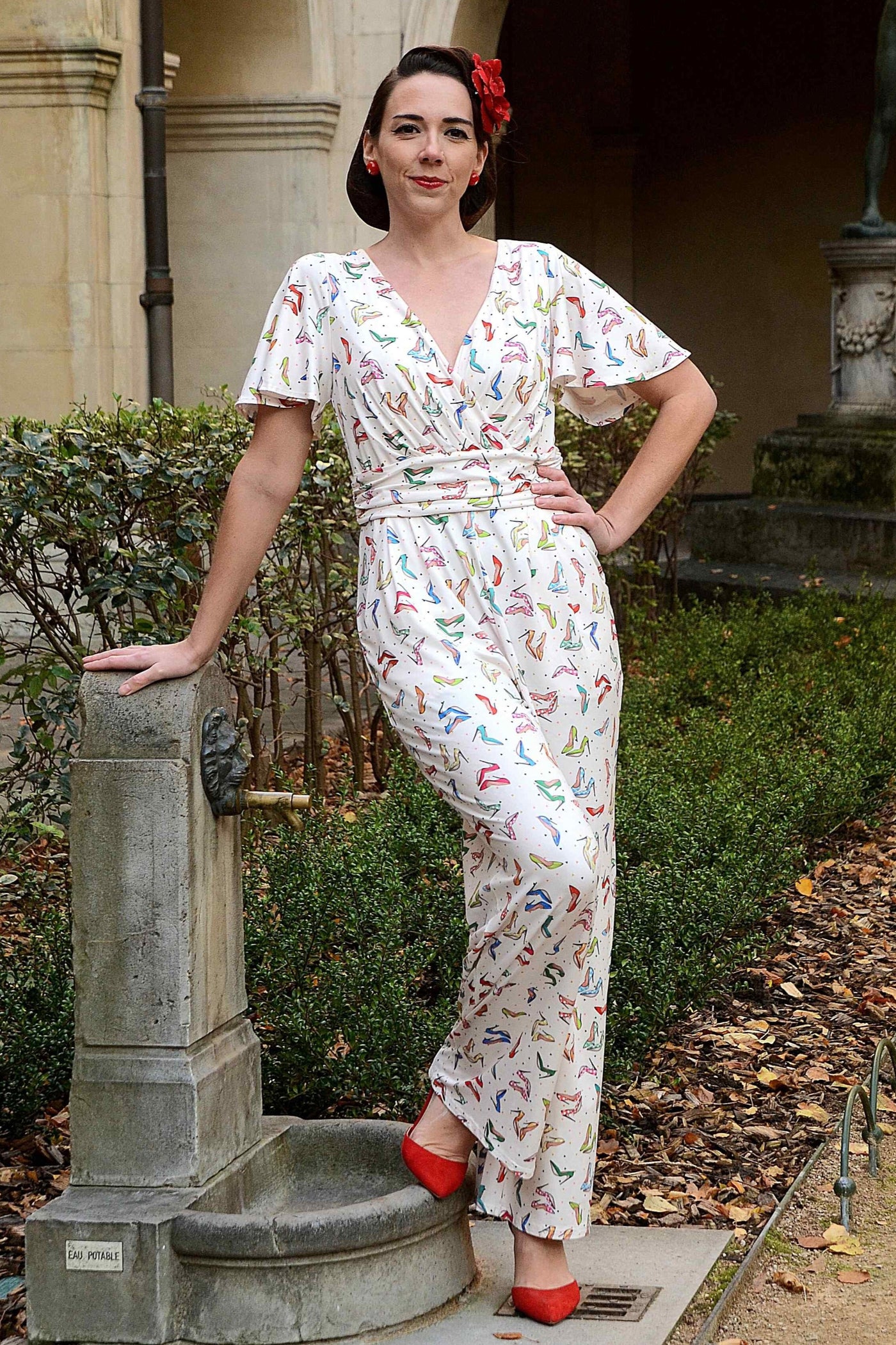 A model wearing Stiletto White Jumpsuit