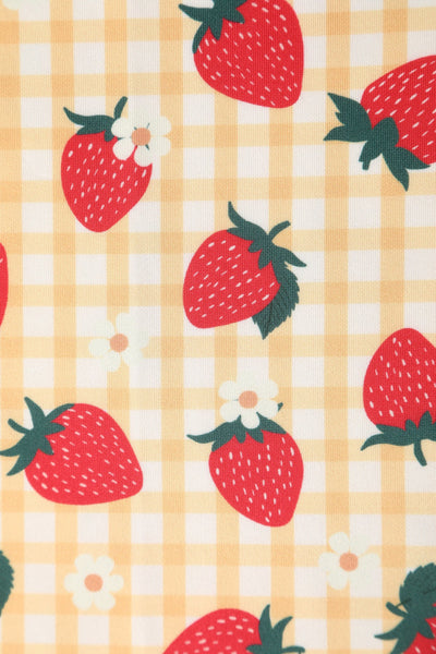 Close up view of Strawberry Yellow Gingham Flared Dress