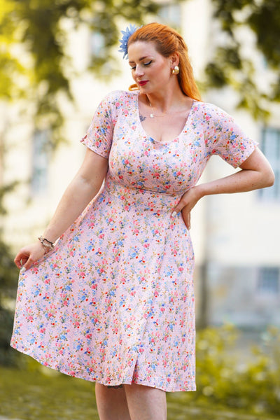 A model wearing a Summer Pink Meadow Dress