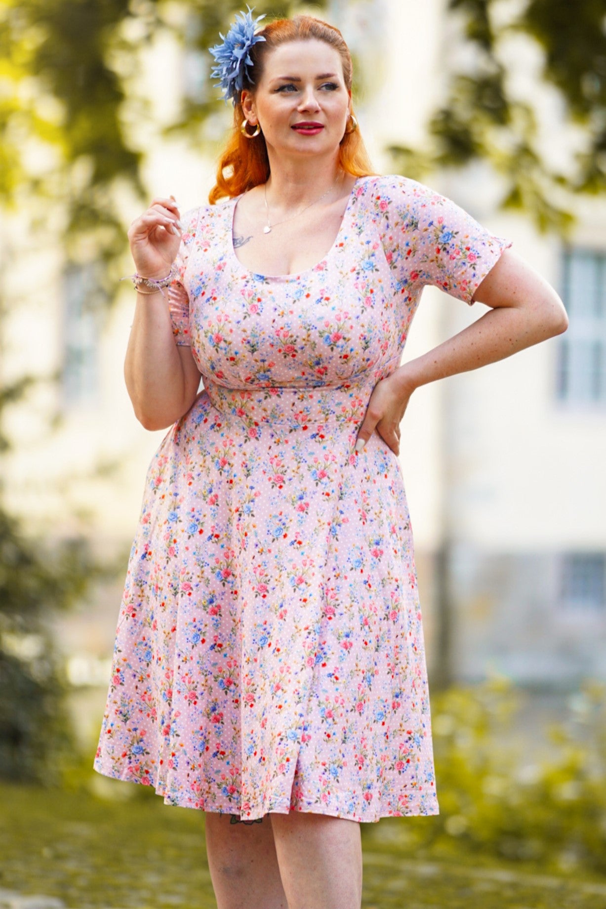 A model wearing a Summer Pink Meadow Dress