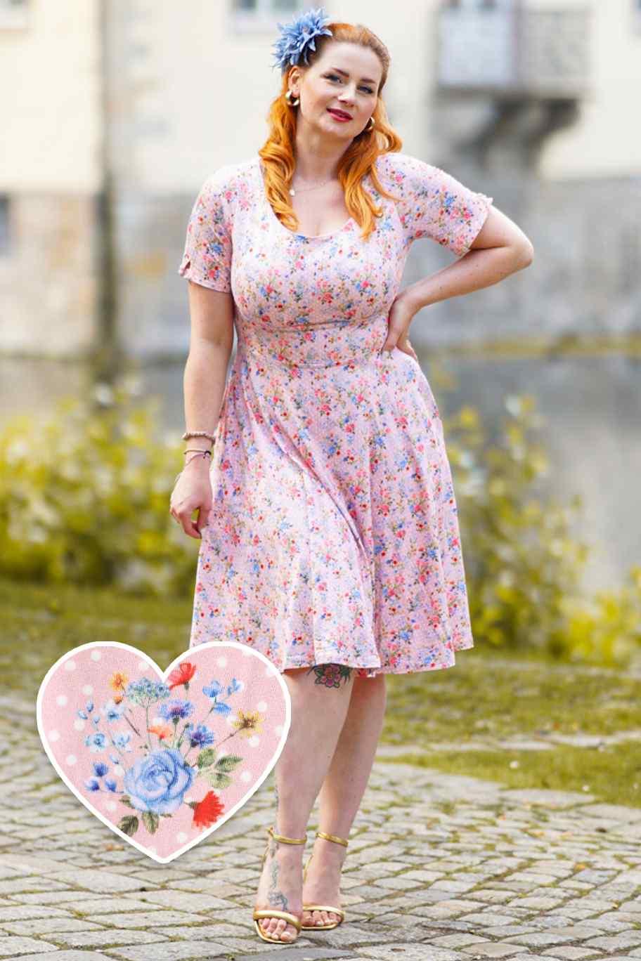 A model wearing Summer Pink Meadow Dress