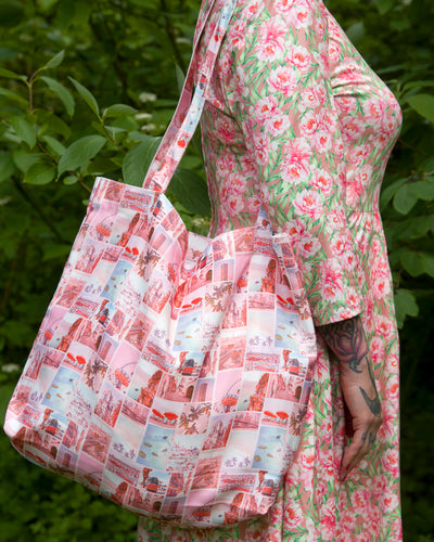 A model wearing our tote bag for size reference
