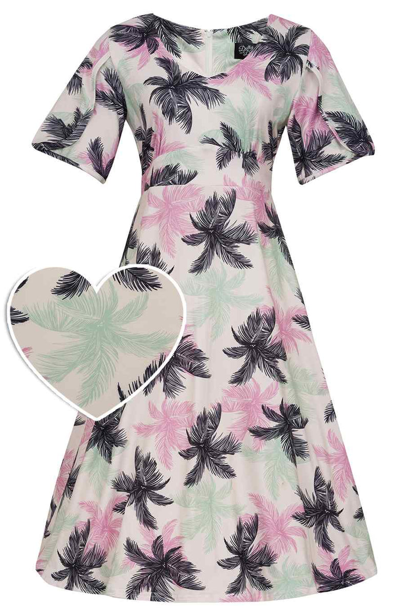 Front view of short sleeved tea dress, in white/black/green/pink palm tree print