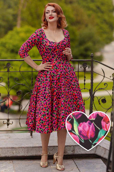 A model wearing a Tulip Midi Dress