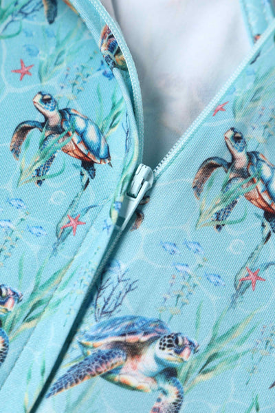 Close up view of Underwater Turtle Print Flared Dress in Light Blue