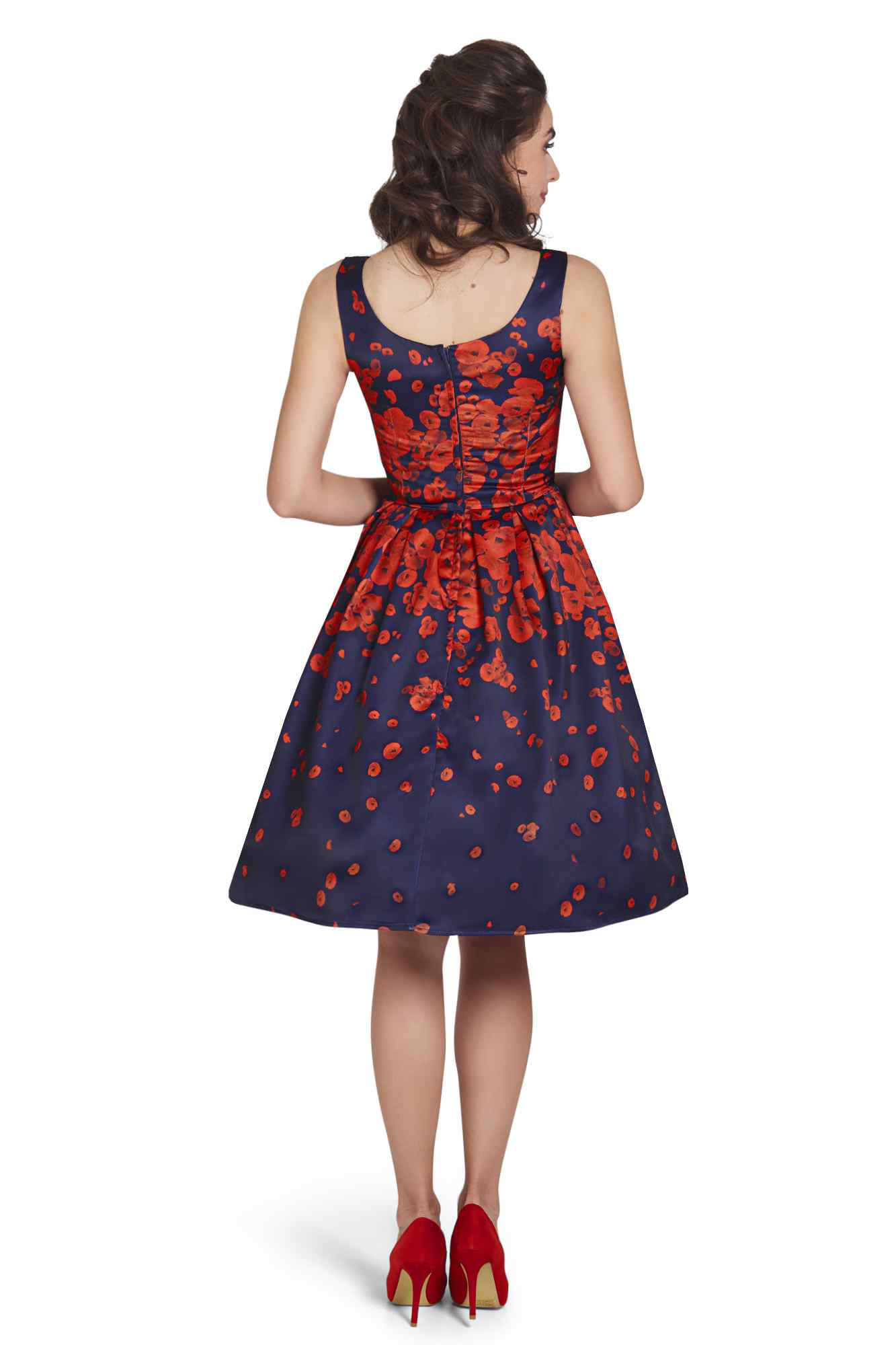 model wearing 50s Inspired Swing Dress Navy with Poppy Flowers