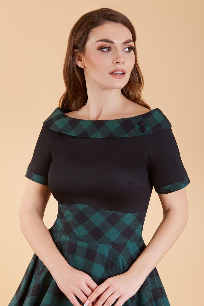 1950s Retro Off Shoulder Swing Dress in Black and Green Tartan close up