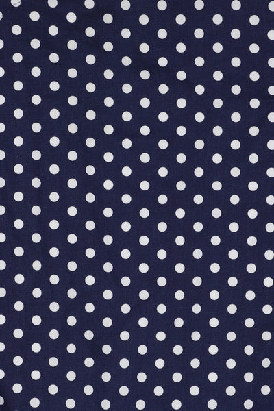 Navy blue fabric with white polka dots