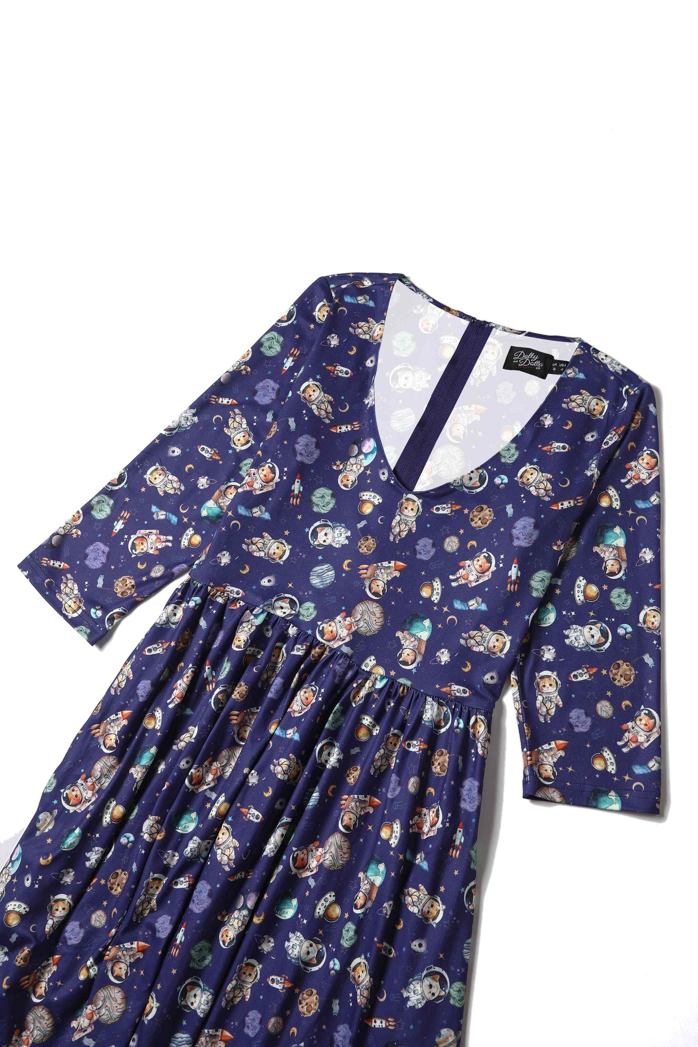 Top view of purple long sleeve dress in space cat galaxy print