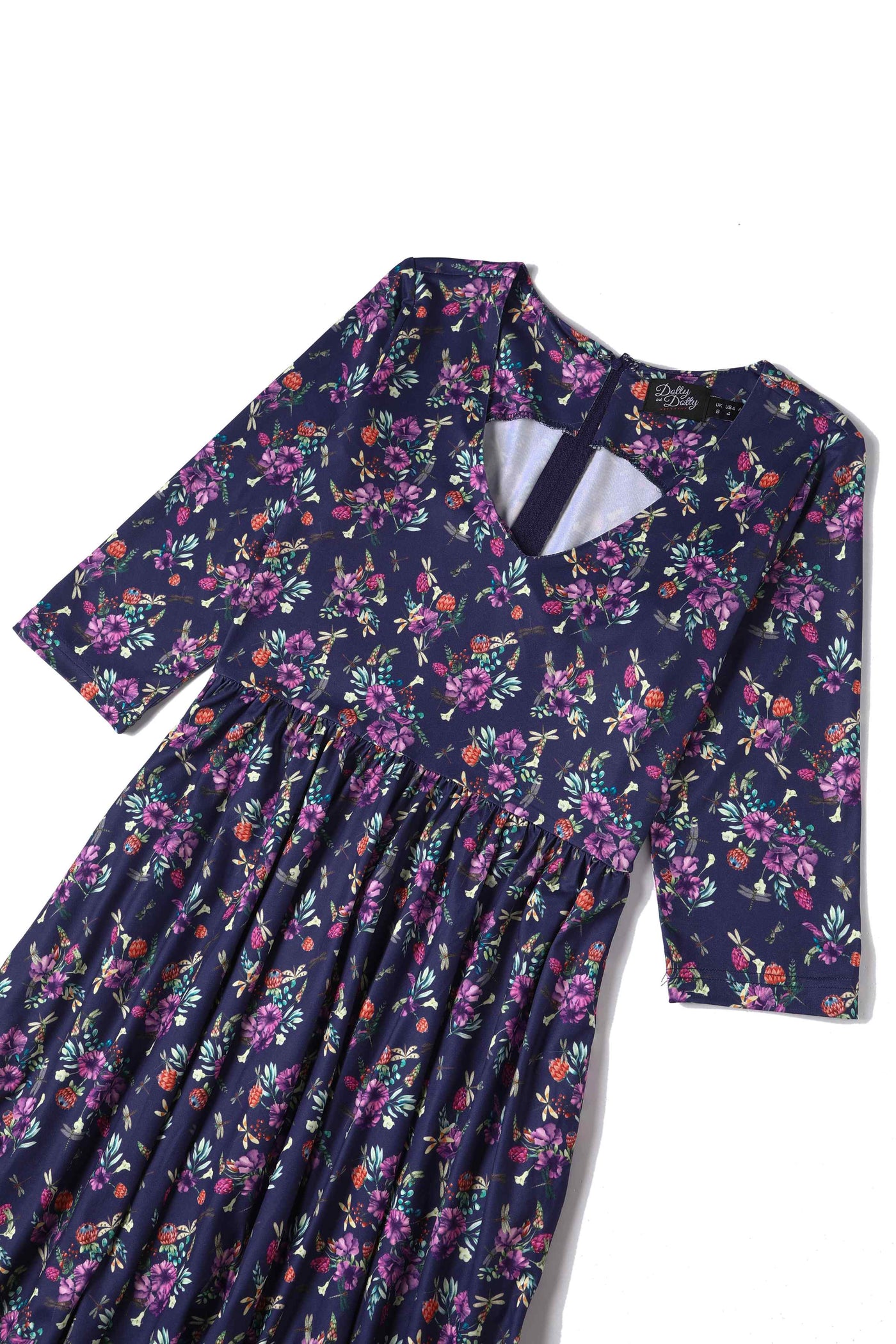 Close up view of Dragonfly and Floral Print Long Sleeved Dress in Purple