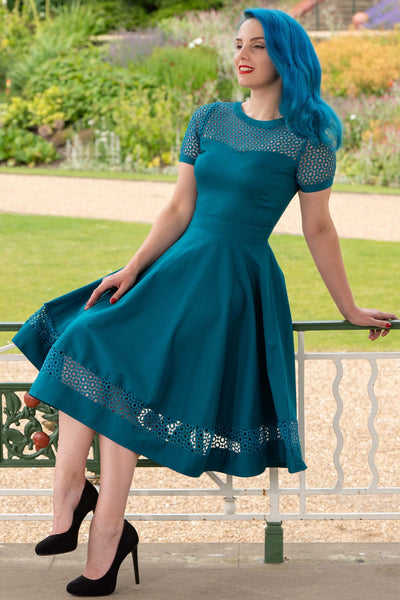 @minavonvixen in Crochet Lace Sleeved Occasion Formal Dress in Peacock Blue side view